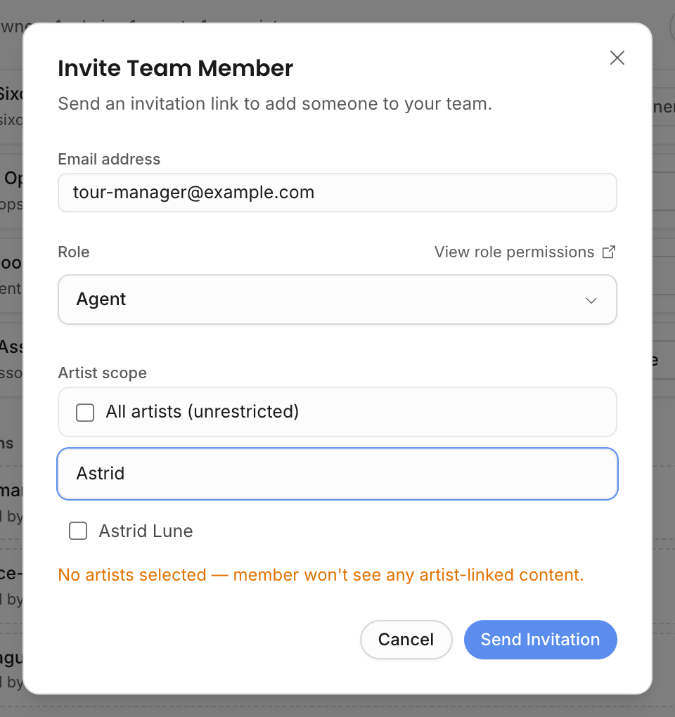 Invite Team Member dialog with email, role, and artist scope controls