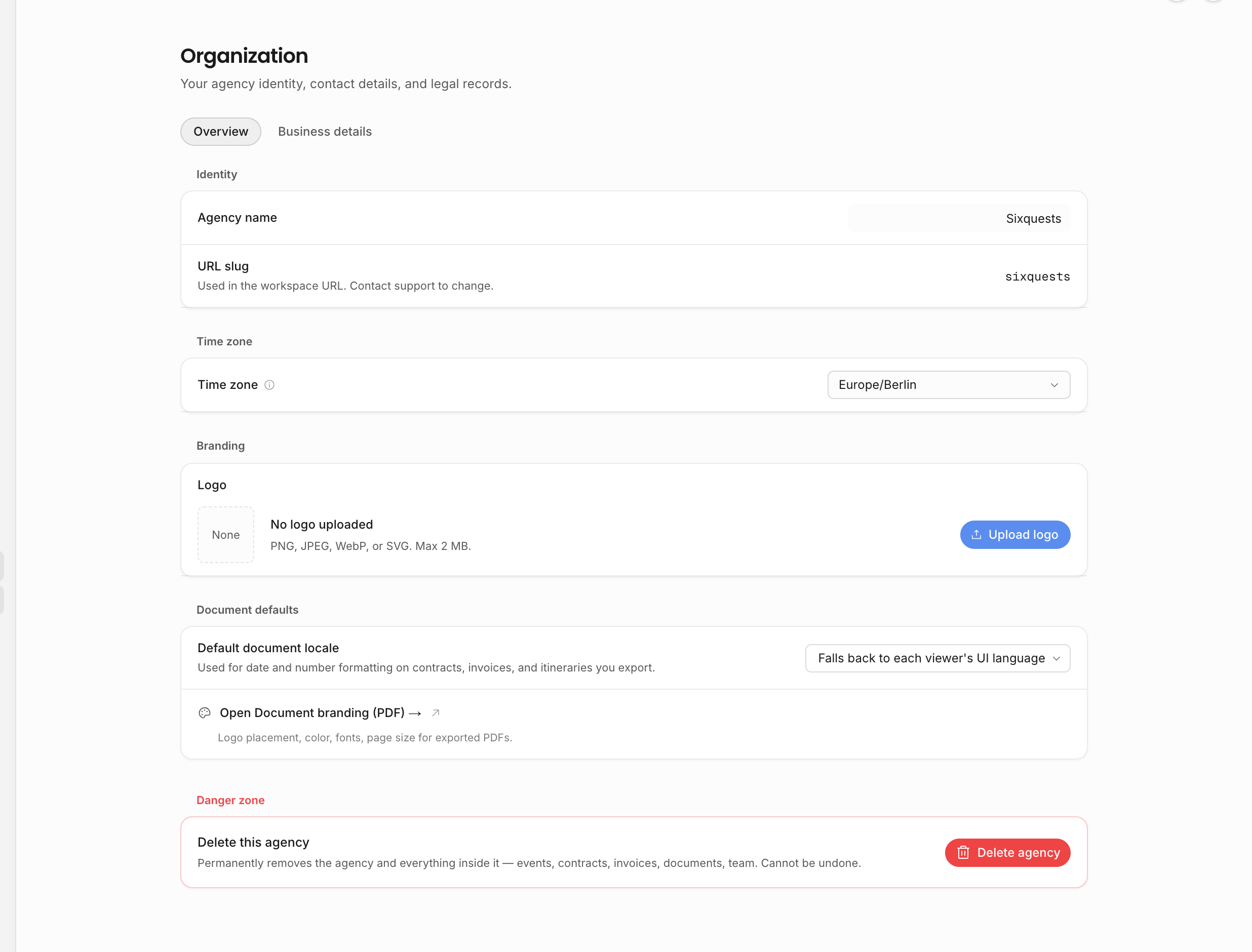 Organization overview settings showing identity, time zone, branding, and document defaults
