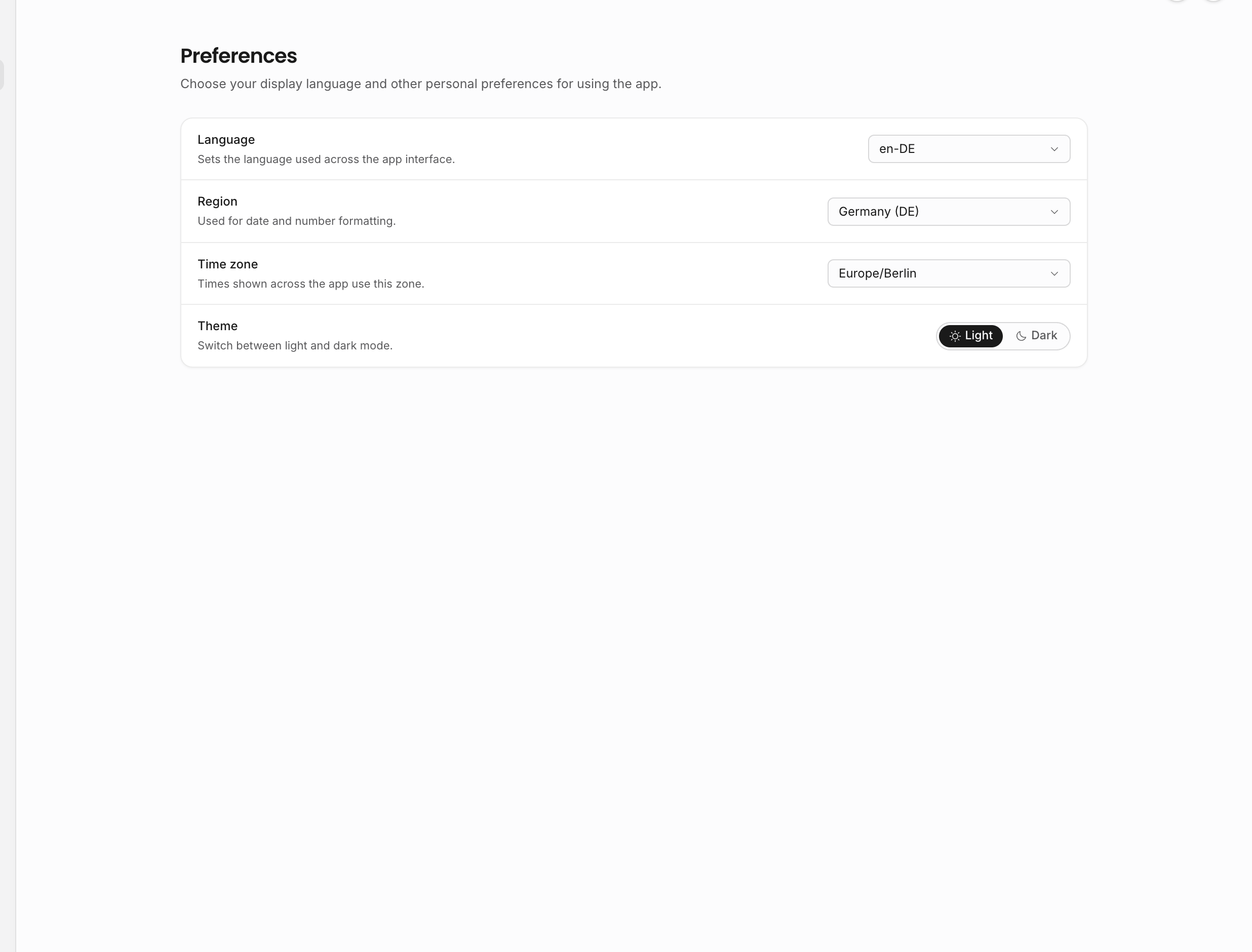 Preferences settings with language, region, time zone, and theme controls